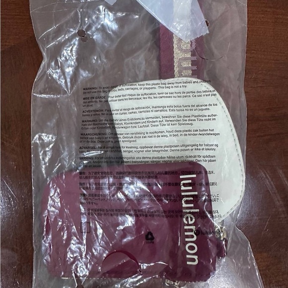 New Lululemon Dual Pouch Wristlet Deep luxe/Gold/Bone - Picture 3 of 4